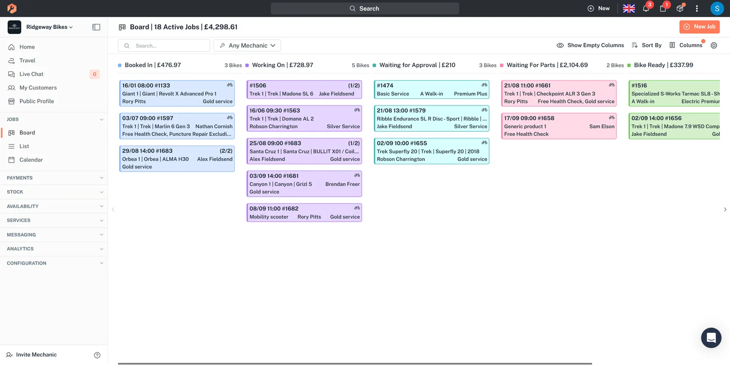 Workshop job board with status columns and jobs in progress